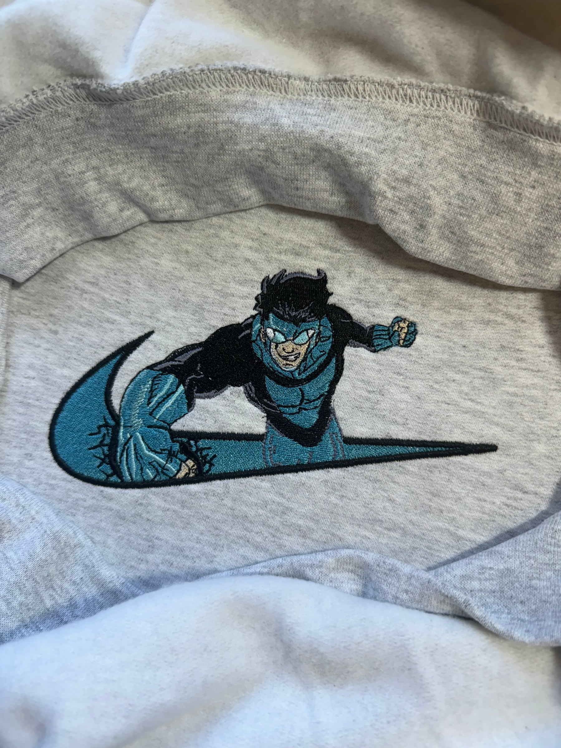 Invincible Blue Suit x Swoosh