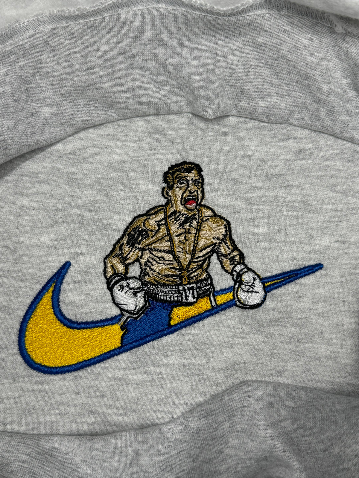 Usyk x Swoosh