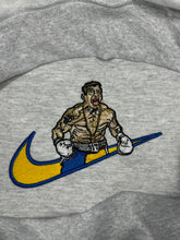 Usyk x Swoosh